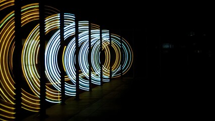Wall Mural - futuristic holographic light streaks a dark bac