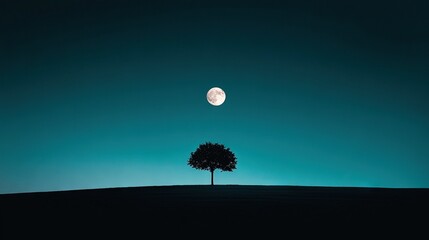 Wall Mural - a solitary tree stands atop a hill under a full moon, casting shadows while a faint crescent moon is