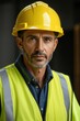 © haiqiang - arafed man wearing a yellow hard hat and vest