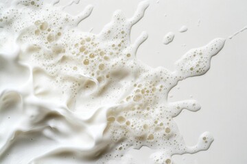 Canvas Print - White foamy liquid creates a splash effect on surface