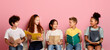 © Prostock-studio - Adorable multiracial schoolkids with study materials on chairs over pink studio background