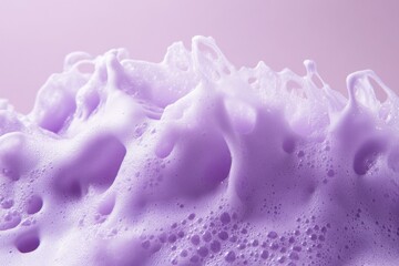 Wall Mural - Purple bubbles and foam coalesce on light pastel background