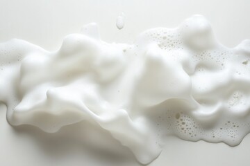 Canvas Print - Creamy white foam spreads across a light neutral surface