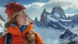 © Prostock-studio - A woman in a vibrant orange jacket gazes at towering peaks and glaciers, surrounded by stunning natural beauty and snow, embodying the spirit of adventure in Patagonia.