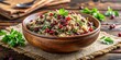 © udomsak - Aromatic bowl of warm wild rice pilaf with cranberries and chopped fresh herbs like parsley or thyme against a rustic wooden background , autumn, wild rice