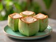 © Ardhana - Fresh young coconuts presented ready to eat for refreshing drinks