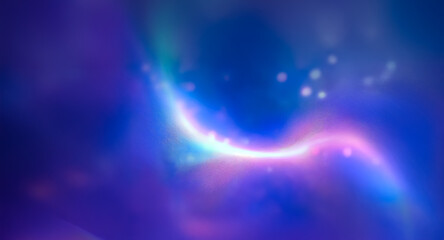 Wall Mural - abstract blurry image features a bright curved rainbow light set against a dark blue and purple back