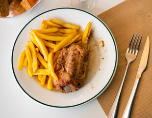 Wall Mural - Plate with juicy delicious pork knuckle and French fries