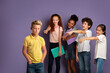 © Prostock-studio - Stop bullying at schools concept. Vicious kids laughing at sad blonde boy over lilac background