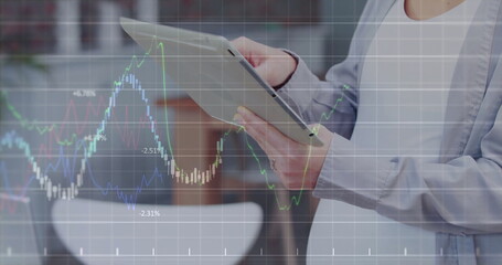 Wall Mural - image of data processing over caucasian woman using tablet