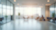 © Amir Bajric - Blurred empty open space office. Abstract light bokeh at office interior background for design.