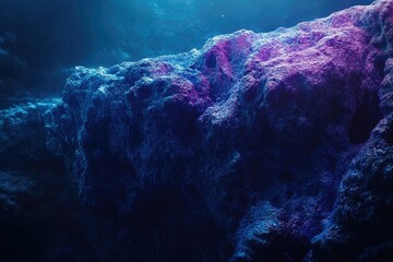Wall Mural - Underwater rock formation illuminated with blue and purple light, creating a mysterious and surreal scene.