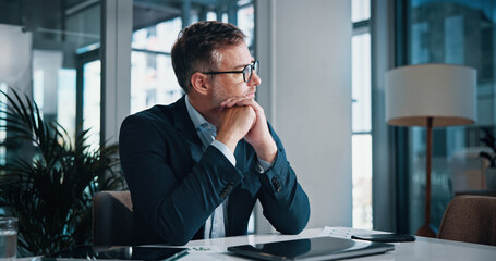 Leinwandbilder - Business, thinking and man in office, solution and decision for career growth, doubt and problem solving. Person, employee and consultant in workplace, laptop and planning with choice and options