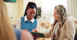 © Flashizzle/peopleimages.com - Happy woman, tablet or meeting with coach for research, project planning or discussion at office. Female people, junior employee or mentor with intern or smile on technology for schedule app or tasks