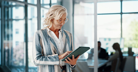 Aufkleber - Tablet, research and mature businesswoman in office checking company revenue margin for stock market. Digital technology, reading and female finance executive with online investment profit report.