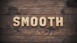 © StockKing - Wooden background featuring a smooth, brown texture with large wooden letters spelling 'SMOOTH' in a light tone, center-aligned for emphasis.