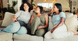 © HockleyM4/peopleimages.com - Woman, friends and laugh with television remote, living room and smile for movies. People, reunion and bonding with entertainment, conversation or discussion for communication on couch with joke