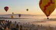 © Firman Dasmir - Hot air balloons soaring over a misty valley at sunrise creating a magical scene