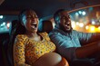 © Saxena - Shouting pregnant woman feeling pain and contractions, lady grabbing her husband's shoulder while man driving car