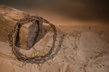 Wall Mural - Crown of Thorns associated with the Passion of Jesus Christ. Fragment of a wooden cross symbol of the Crucifixion at Calvary and Good Friday in Christianity according to the New Testament