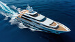 © Tipapat - Aerial drone top view photo of beautiful modern super yacht with wooden deck cruising in high speed