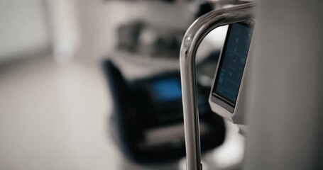 Poster - Close Up Of Medical Equipment With Control Panel And Blue Light Screen And Blurred Background