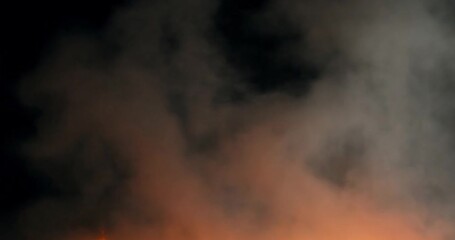 Leinwandbilder - Blurred cloud of smoke, black background and red and orange color