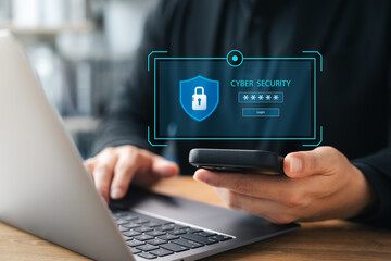 Wall Mural - cyber ​​security, businessman using encrypted laptop and smartphone to protect personal information 