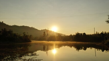 Wall Mural - sunrise over the lake