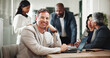 © peopleimages.com - Portrait, laptop and happy business man in office at venture capital for meeting. Investment, professional manager and financial analyst coworking with team for private equity, data or profit growth
