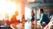 © Perecciv - Group of people silhouettes against large window, businessmen participating in meeting or discussion.