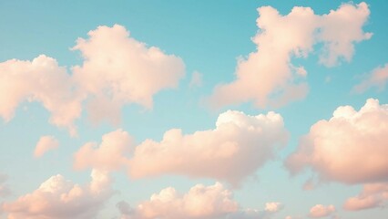 Wall Mural - Beautiful background image of a romantic blue sky with soft fluffy pink clouds Panoramic natural vie