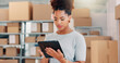 © peopleimages.com - Tablet, delivery and shipping with woman in warehouse for logistics route, tracking code and cargo box. Inventory checklist, ecommerce with African person in factory for supplier distribution