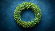 © annafik - Green wreath on blue background, spring decoration