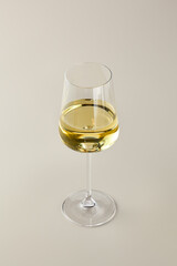 Aufkleber - Minimalist Elegance A Glass of White Wine in Soft, Neutral Tones