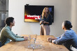 © Wavebreak Media - In conference room, diverse colleagues listening to business meeting presentation, at office