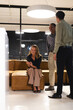 © Wavebreak Media - Diverse colleagues in office laughing and discussing work during night meeting