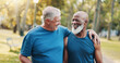 © peopleimages.com - Elderly, men and talk with fitness outdoor of mobility training, bonding discussion and morning routine. Smile, senior friends and walking with embrace, retirement exercise and cardio workout at park
