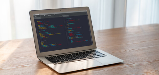 Software development programming on computer screen for modish application and program coding