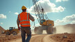 © PixelPerfectionist77 - A worker operates heavy machinery on a construction site.