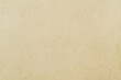 © reni - Beige textured paper background.