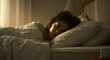 © Silva - Woman sleeping peacefully in bed for wellness and relaxation concepts