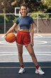 © peopleimages.com - Woman, game and basketball portrait on court, player and ready for outdoor competition. Athlete, recreation centre and person for fitness in community, practice skills and confidence with exercise