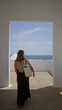 © Krakenimages.com - Woman walking outdoors in lanzarote carrying a bag with the ocean in the background on a sunny day