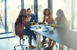 © peopleimages.com - Boardroom, negotiation and people with documents, talking and collaboration for ideas in advertising agency. Planning, team and group with budget for campaign, media strategist or paperwork in office