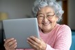 © Sanchai - Senior woman, hug and laptop with support in home with tech learning and helping with internet banking Family love, mom and embrace with smile, happy and care with planning and digital assistance