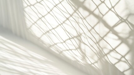 Abstract background with the shadow of a net on a white wall, with light and soft tones, in a minimalistic style, focusing on texture and shape, with clear edges for text or product display,