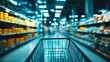 © nisi - A blurred background of an empty shopping cart in the supermarket, captured from the inside looking out towards shelves with various products.