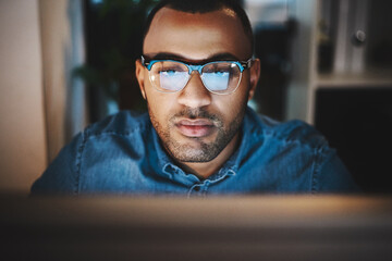 Fototapete - Business, man and glasses by computer at night for article draft deadline, online research or story information. Journalist, employee and screen reflection for proposal submission or creative process