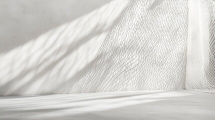 Abstract background with the shadow of a net on a white wall, with light and soft tones, in a minimalistic style, focusing on texture and shape, with clear edges for text or product display,